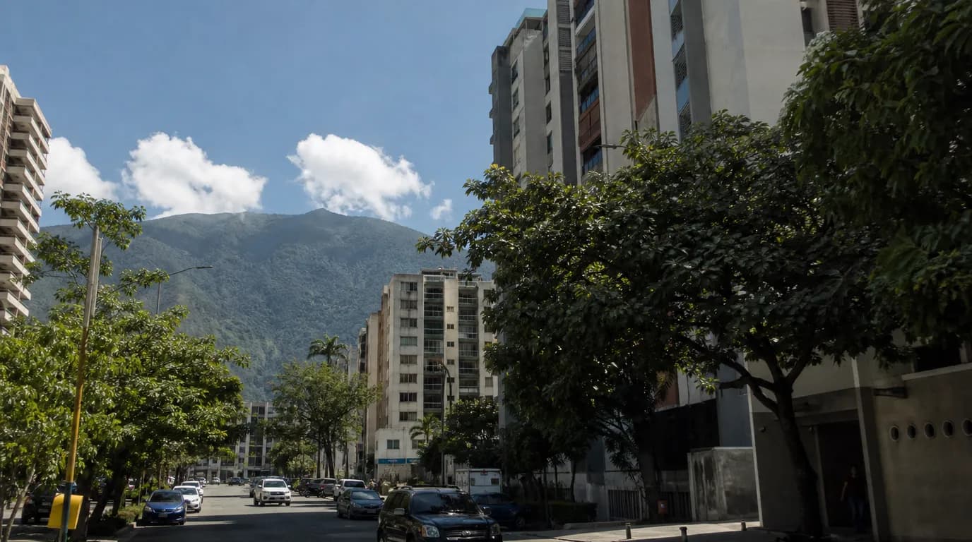 Residential avenue in Altamira, eastern Caracas, with apartment towers and El Ávila in the background