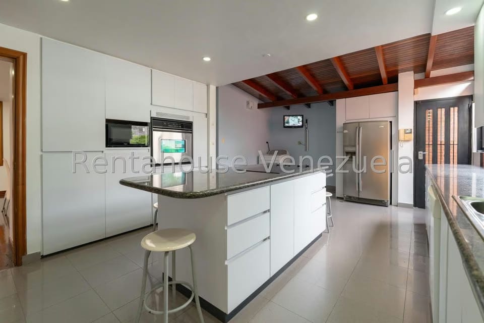 Casa (Multipes Niveles) en Venta en Cumbres de Curumo, Distrito Metropolitano - 13