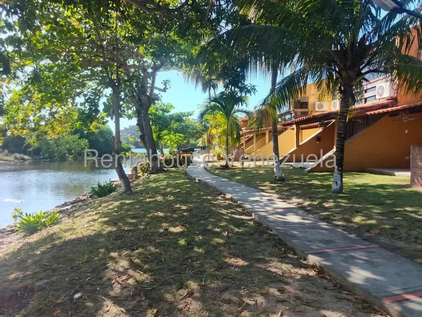Apartamento (1 Nivel) en Venta en Los Canales de Rio Chico, Miranda - 36