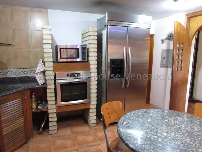 Casa (Multipes Niveles) en Venta en Los Naranjos del Cafetal, Distrito Metropolitano - 25