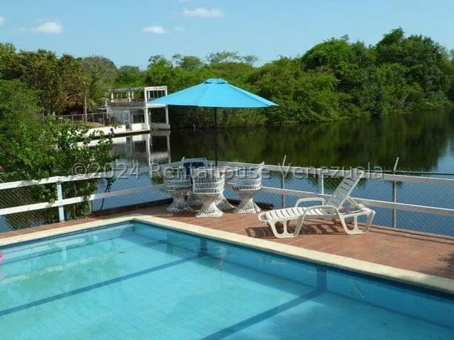 Casa (1 Nivel) en Venta en Los Canales de Rio Chico, Miranda - 32