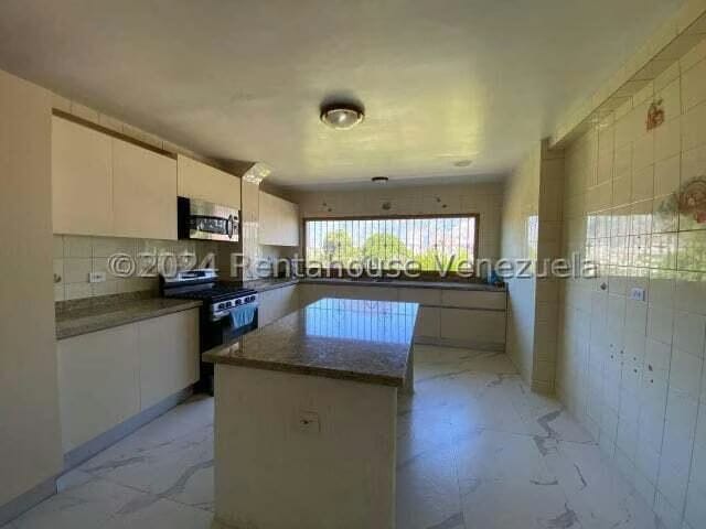 Casa (Multipes Niveles) en Alquiler en Colinas de Los Ruices, Distrito Metropolitano - 56