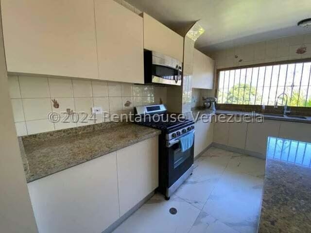 Casa (Multipes Niveles) en Alquiler en Colinas de Los Ruices, Distrito Metropolitano - 59